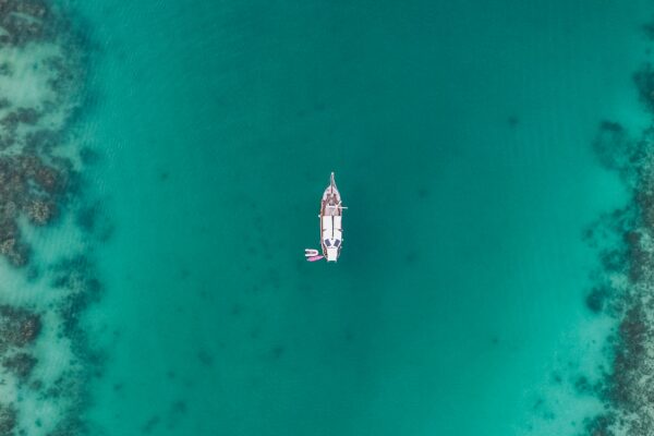 Yacht cruising in the blue ocean